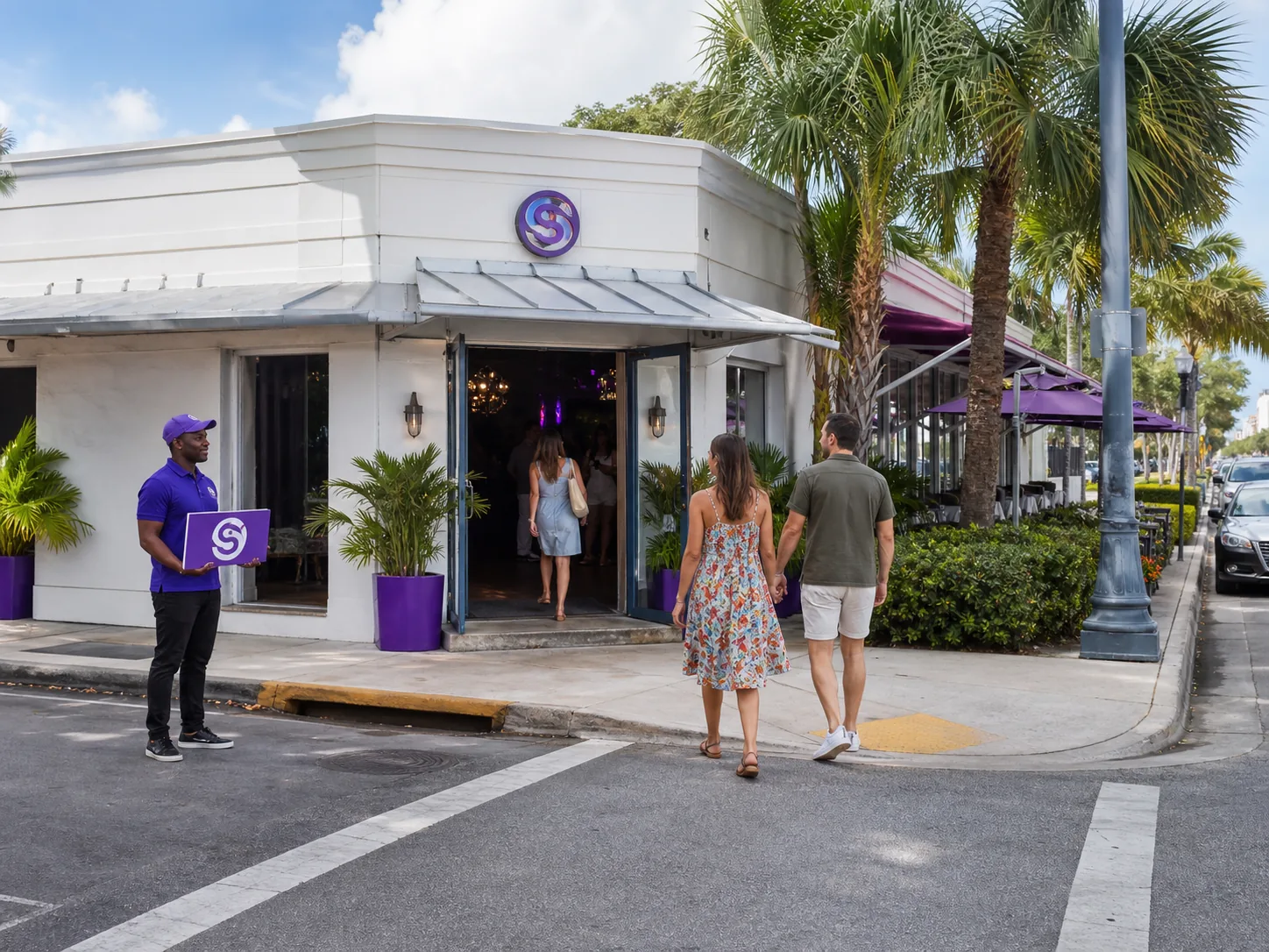 Customers approaching a business while a promoter supports the arrival path